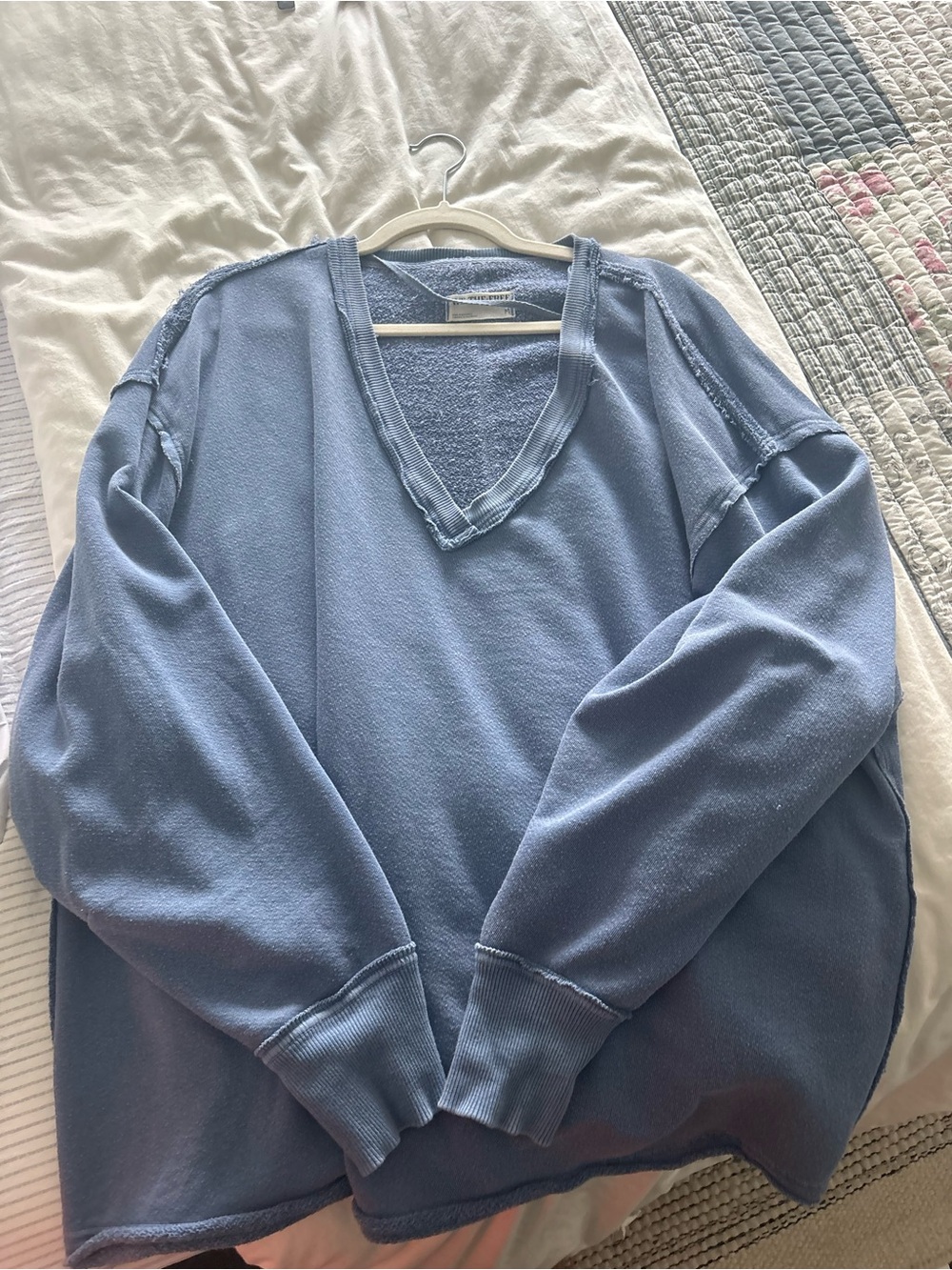 Free people relaxed distressed v neck sweater